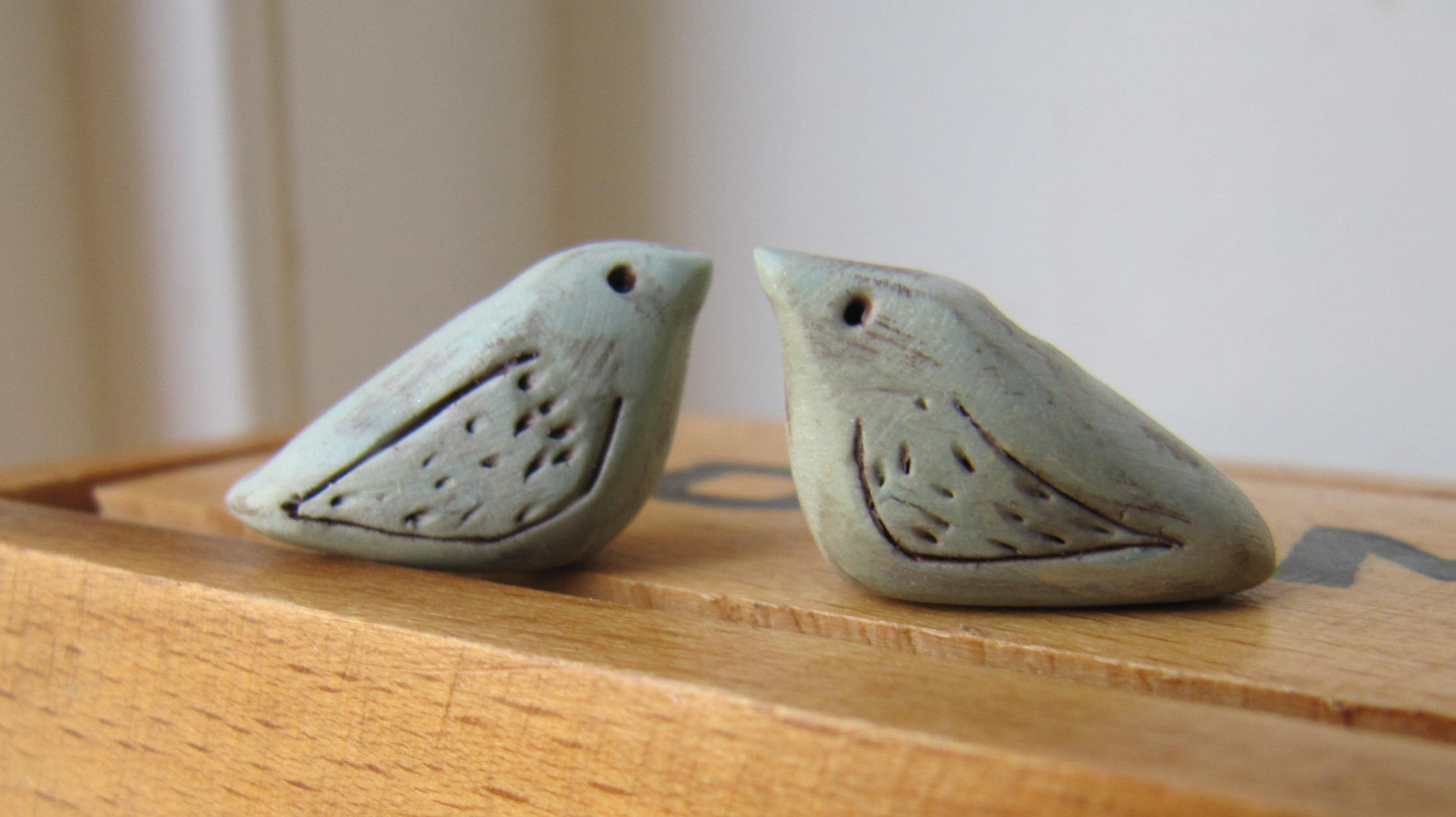 wee olive grey birds