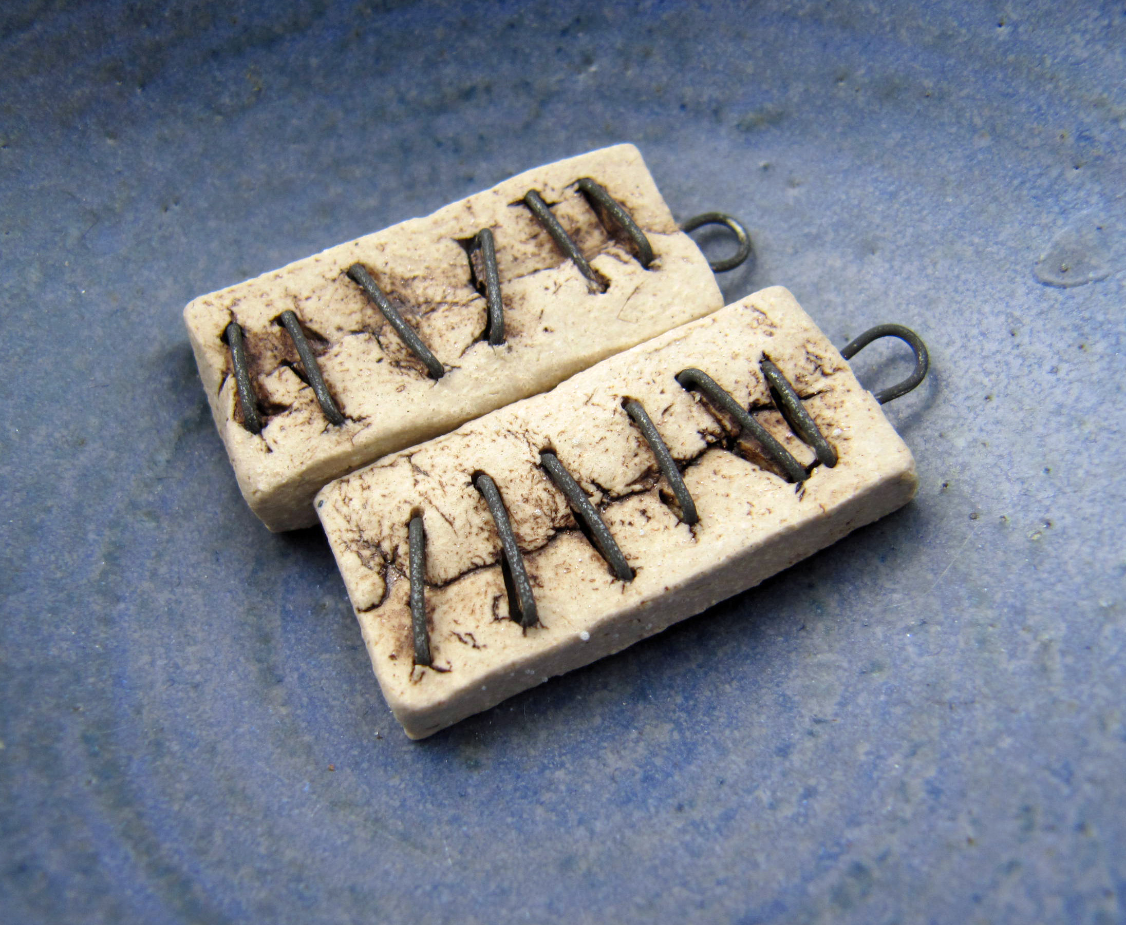 stapled earring charms