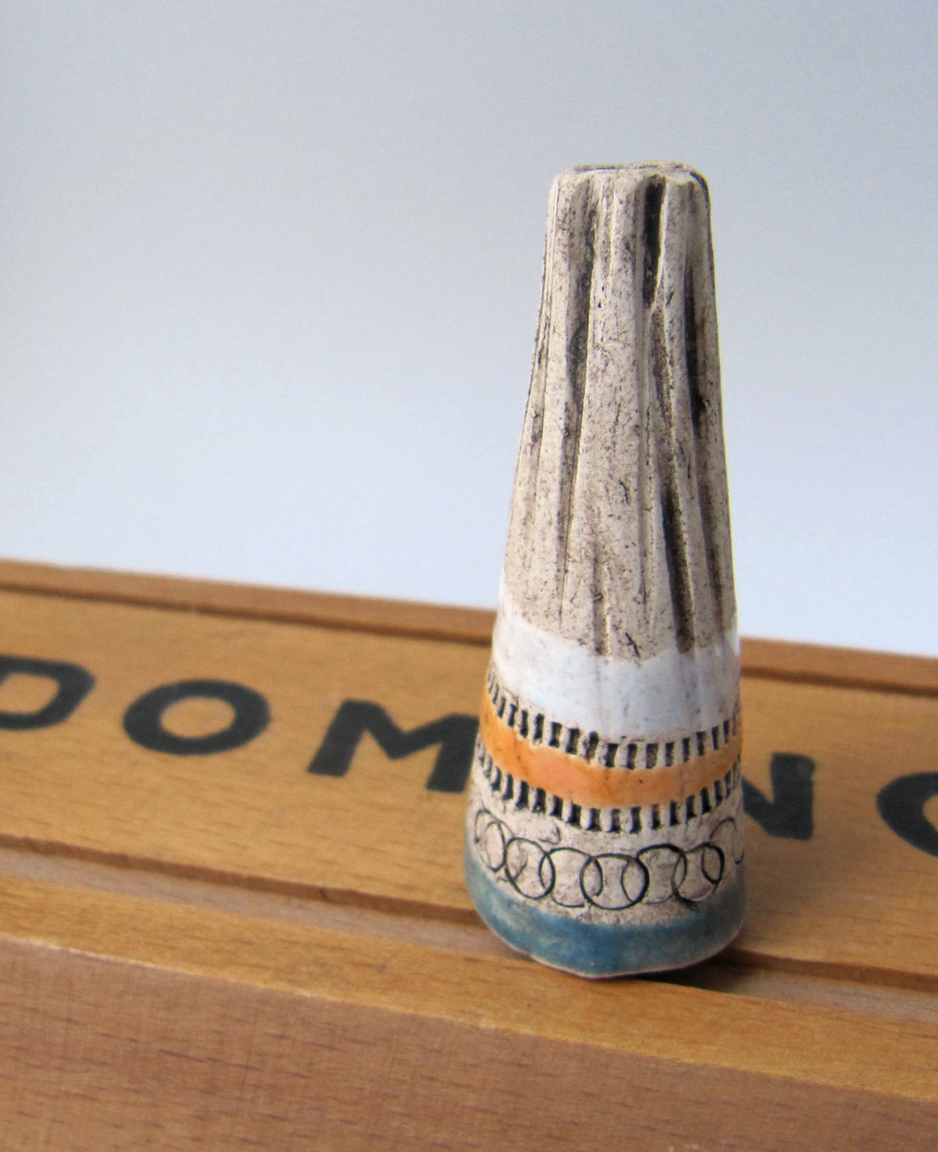 striped primitive carved focal cone