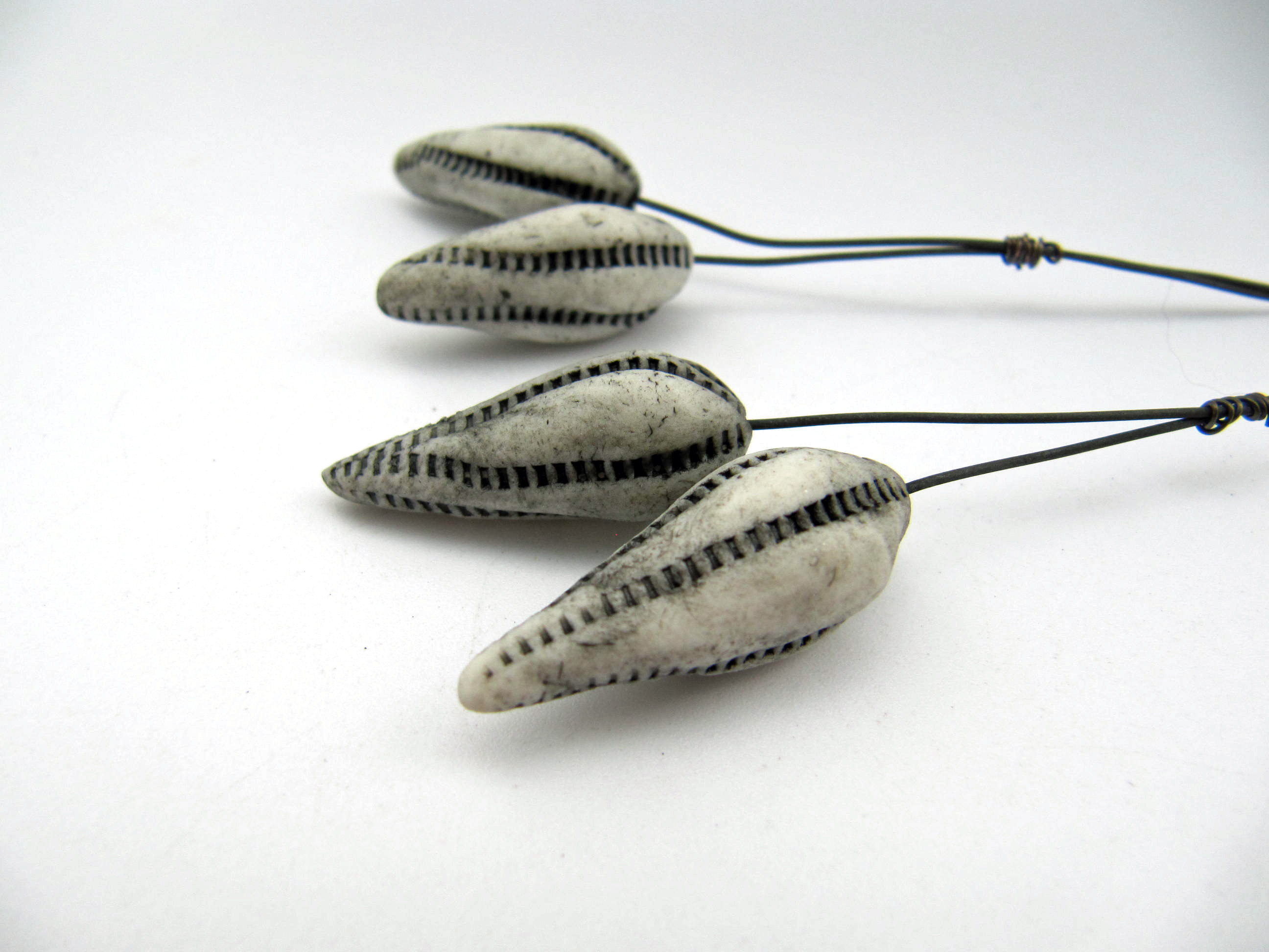 black on porcelain primitive pod pins 2