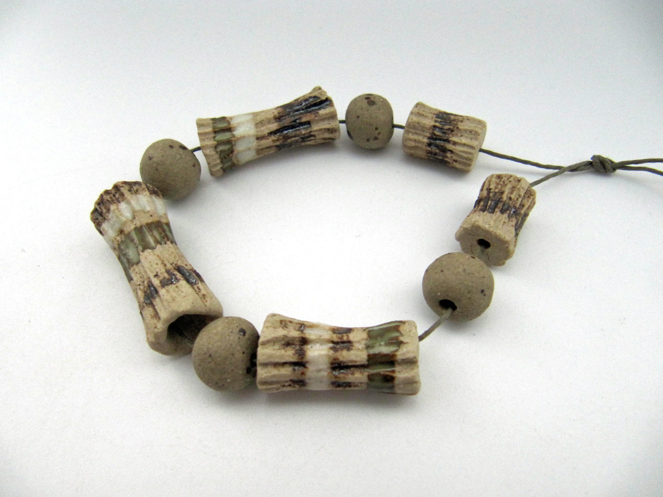 olive band carved bone set 1