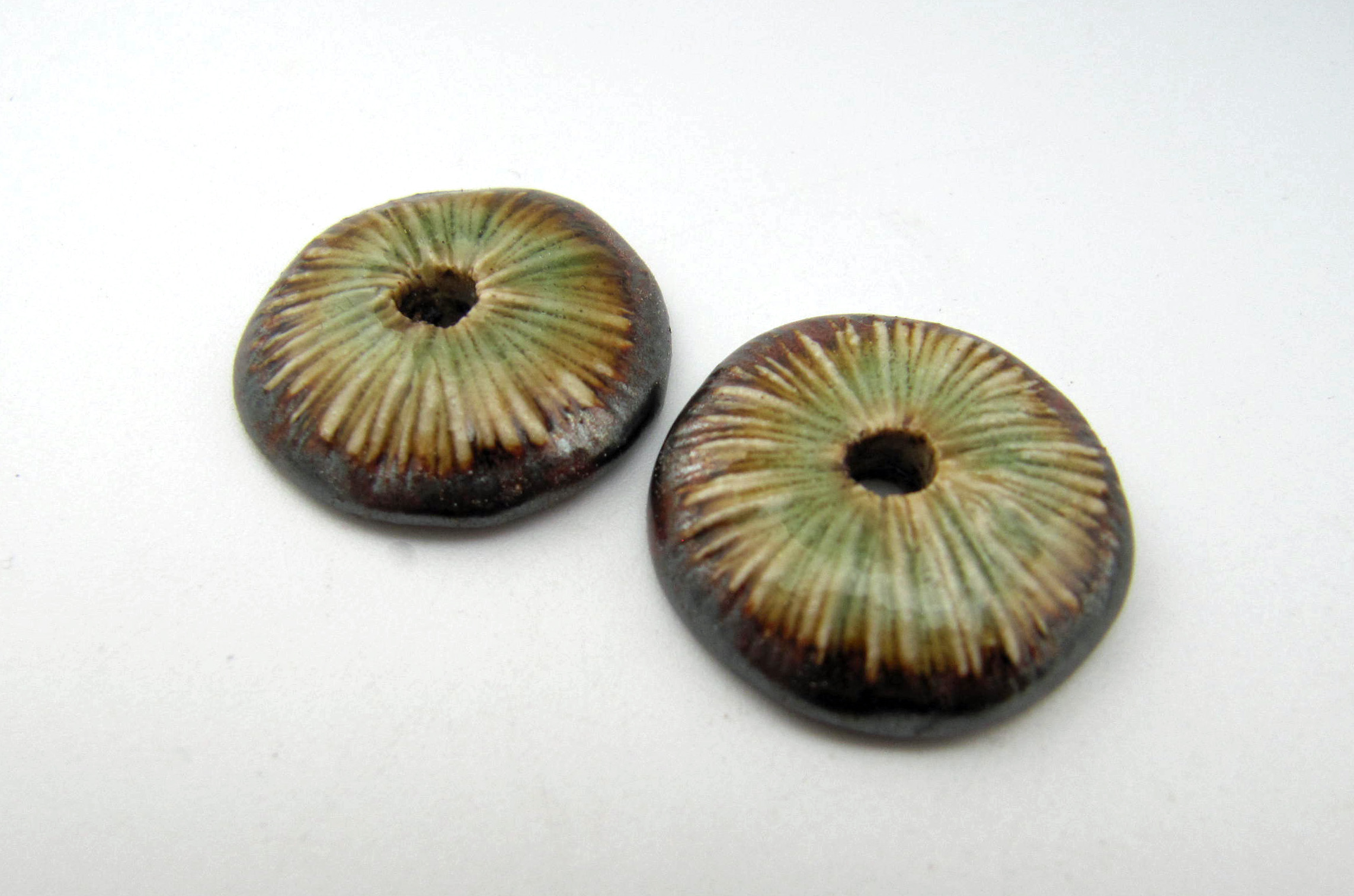 red-copper-and-aqua-textured-discs